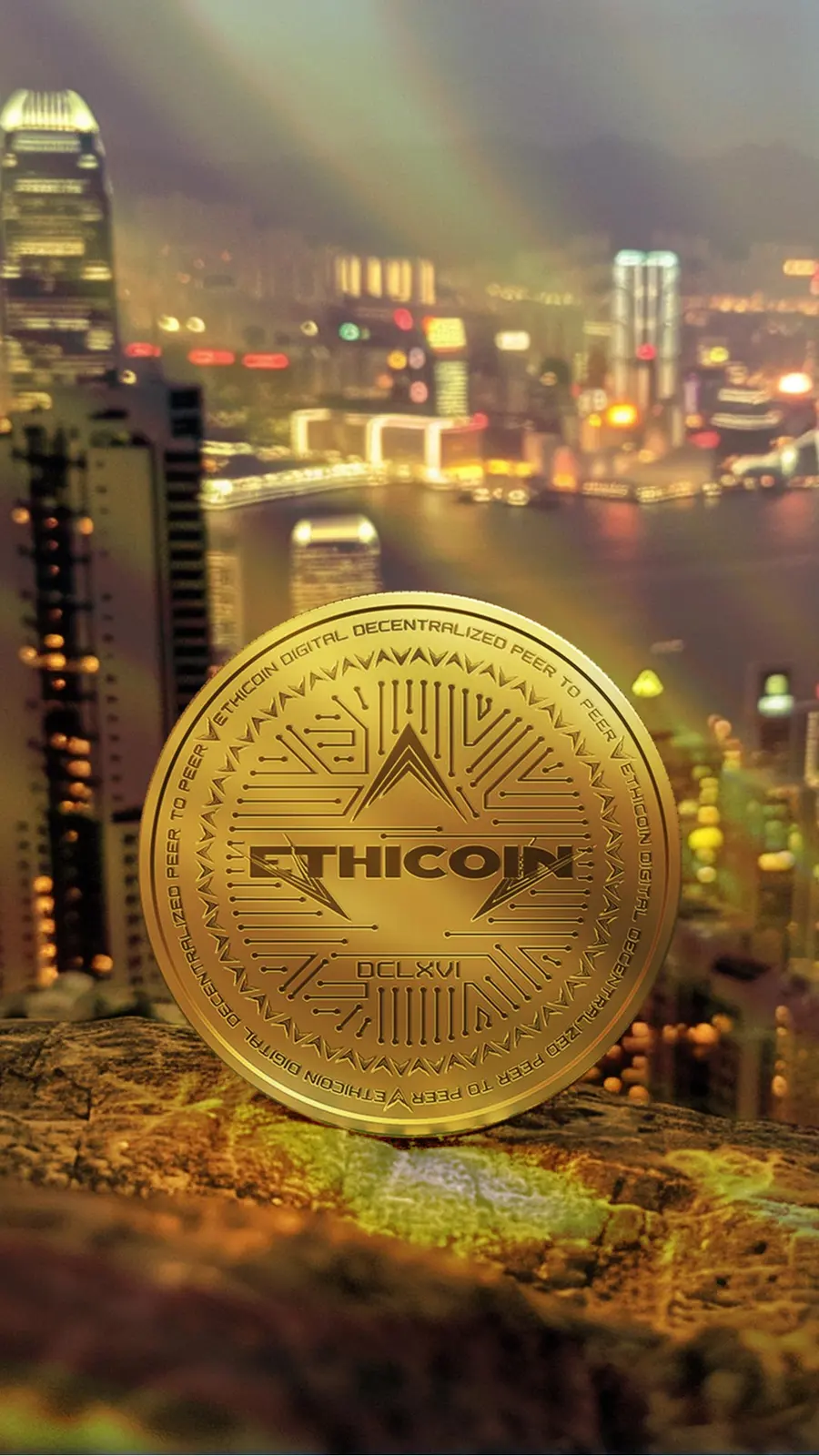 A gold Ethicoin on a rock above a city harbour at night